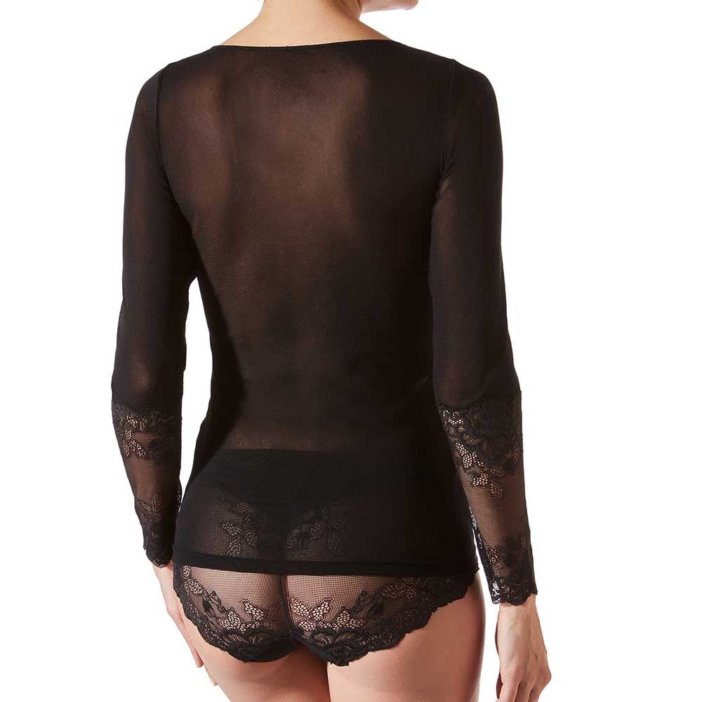 Model wearing Greta Long Sleeve In Black - Janira, back view